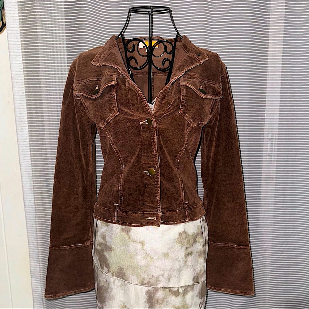 Vintage brown corduroy jean jacket with long bell sleeves.